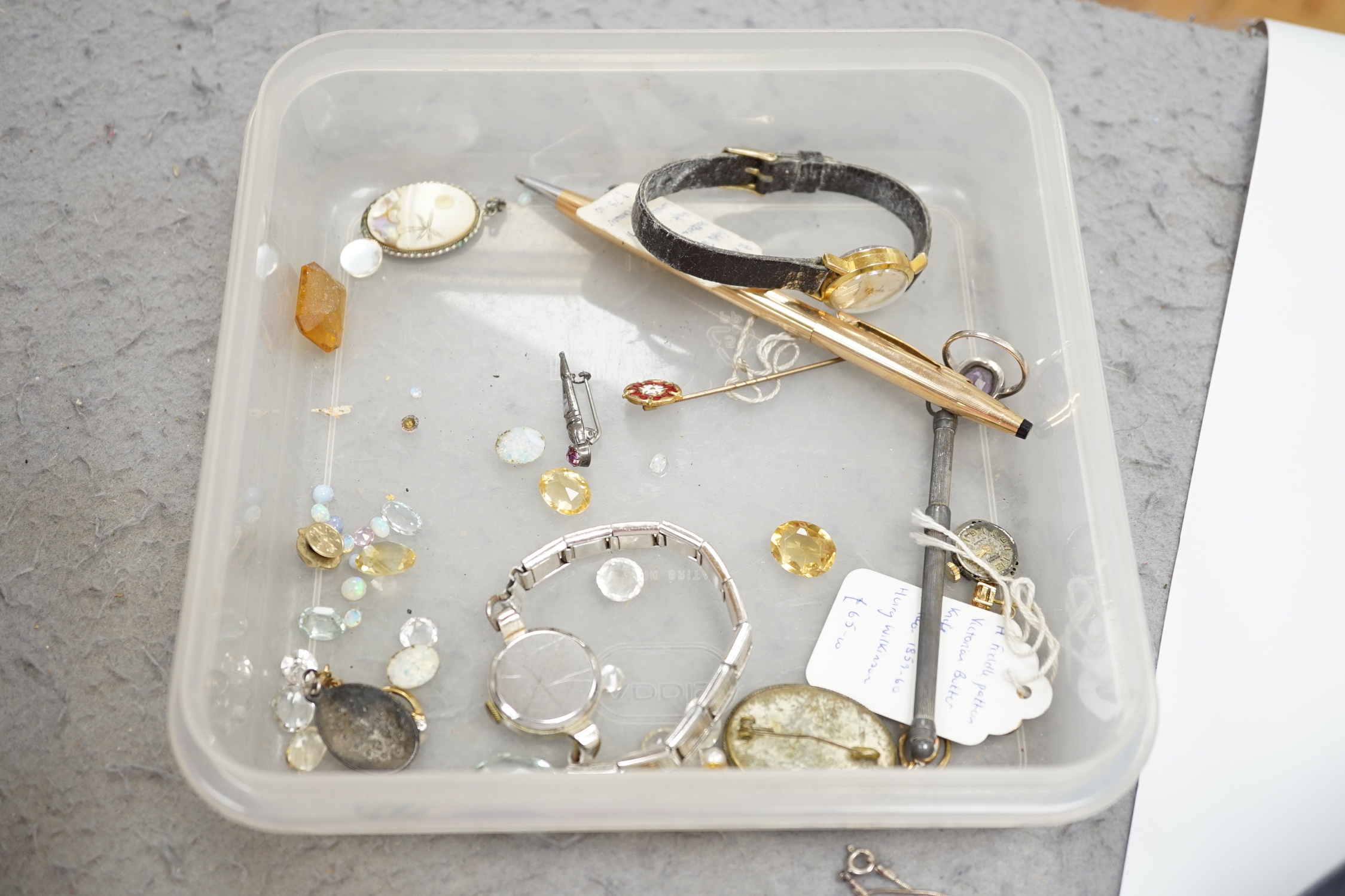A small group of jewellery, silver and other collectables including a modern silver meat skewer, 20.6cm, silver napkin rings, Swiss 935 white metal pocket watch, unmounted cut stones, pen, opera glasses etc.